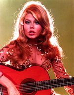 Charo poses with guitar